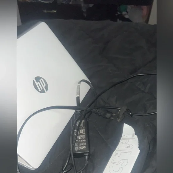 HP Silver Laptop with Black and Red Accessories